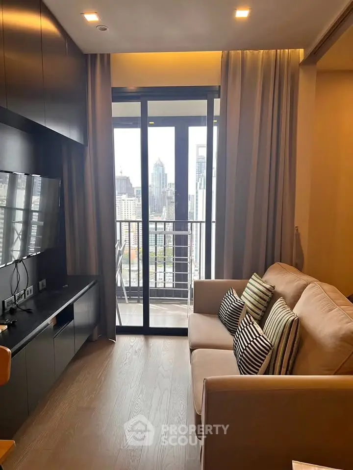 Modern living room with city view and cozy sofa in high-rise apartment