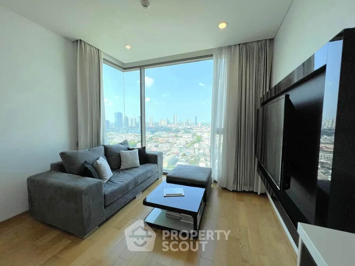 Luxurious living room with panoramic city view and modern furnishings