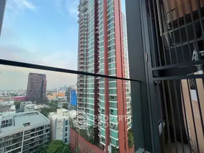 Stunning city view from modern high-rise balcony