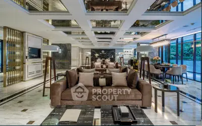 Luxurious modern living room with elegant decor and spacious seating area.