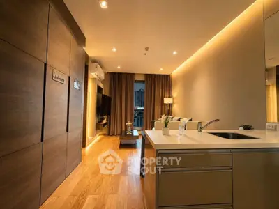 Luxurious modern living room with open kitchen and elegant lighting