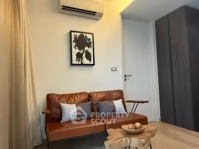 Stylish living room with leather sofa and modern decor