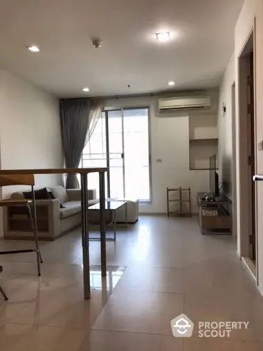 Fully Furnished 2 Bedrooms Condo at Rhythm Sukhumvit 50 Livingroom