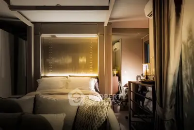 Luxurious bedroom with ambient lighting and elegant decor, perfect for relaxation and comfort.