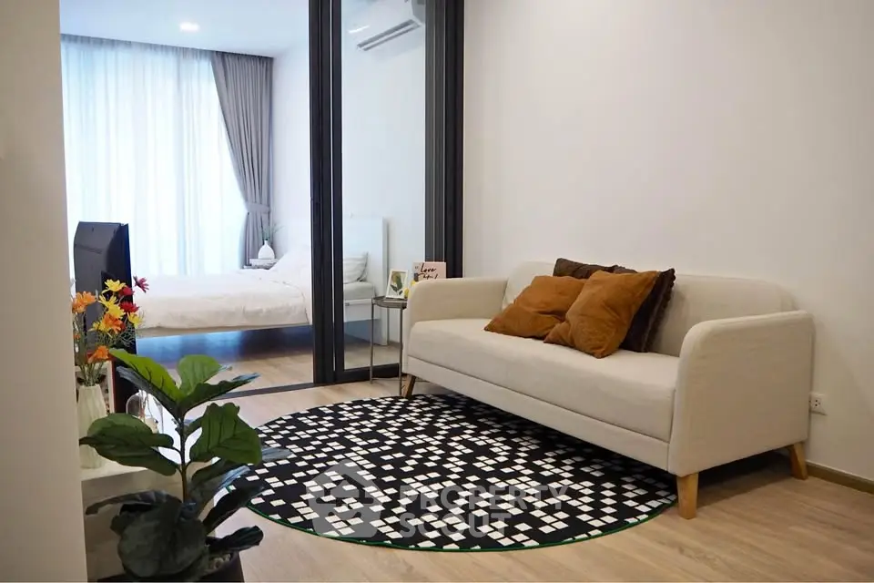 Modern living room with cozy sofa and stylish decor in a contemporary apartment