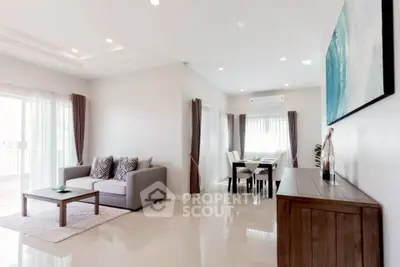 Spacious modern living room with elegant decor and natural light