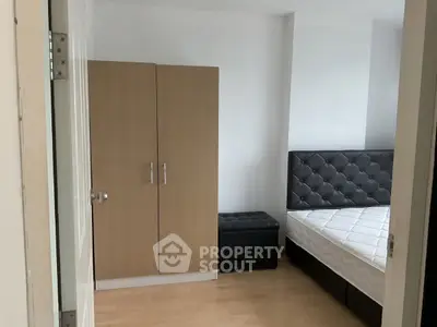 Cozy bedroom with modern furniture and ample storage space