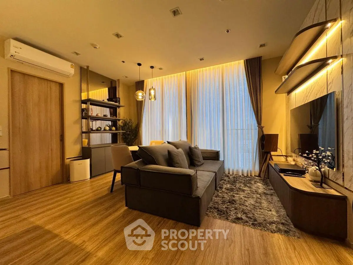 Luxurious modern living room with elegant decor and ambient lighting