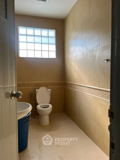 Cozy bathroom with natural light and modern fixtures