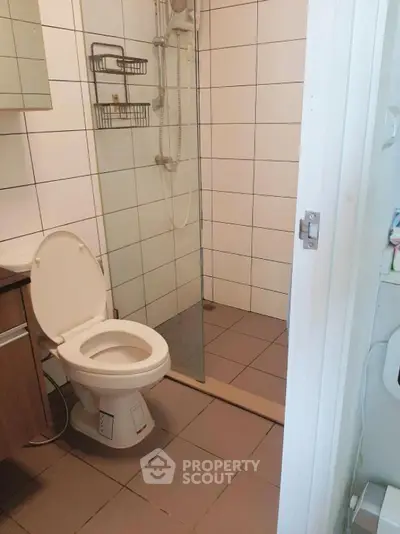 Modern bathroom with shower and toilet in a stylish apartment