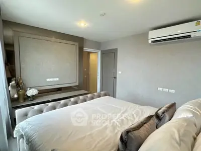 Luxurious bedroom with elegant decor and modern air conditioning unit