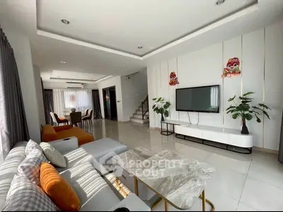 Spacious modern living room with elegant decor and natural light