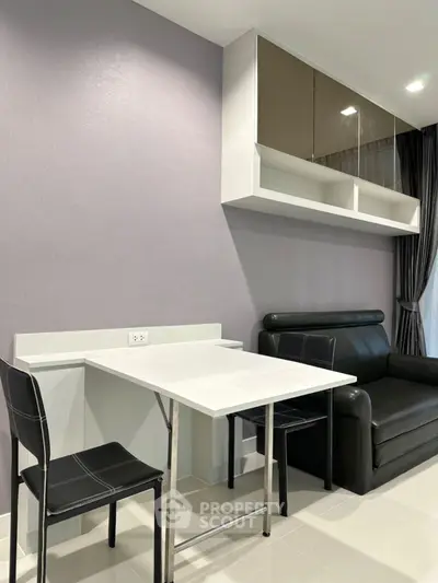 Modern living room with sleek furniture and stylish wall storage