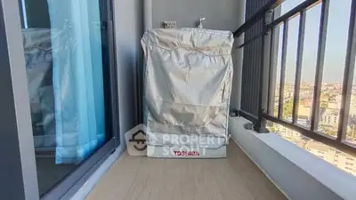 Charming balcony with city view and covered washing machine, ideal for urban living.