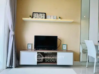 Modern living room with sleek TV stand and decorative shelf