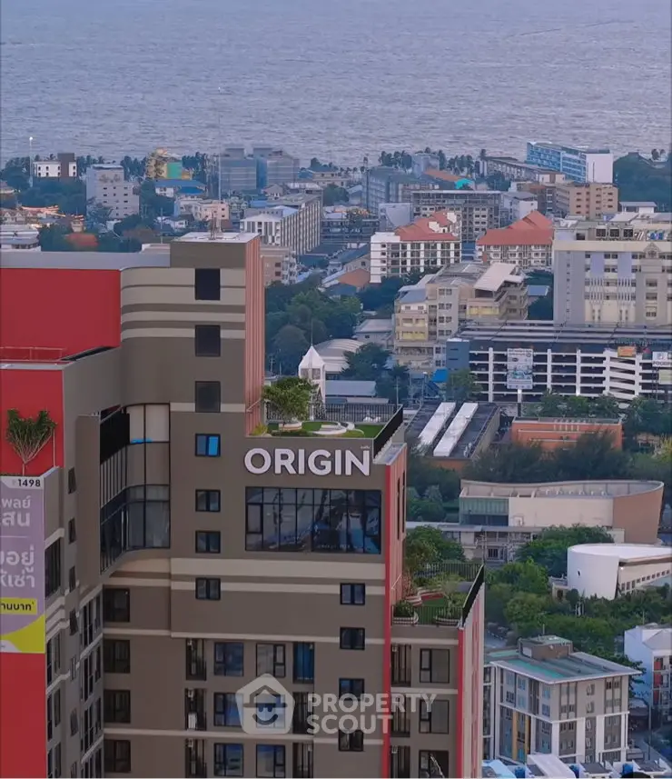 Stunning high-rise building with ocean view in vibrant cityscape