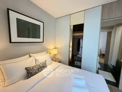 Luxurious bedroom with modern decor and cozy ambiance
