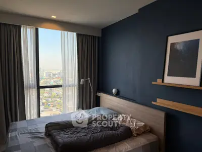 Modern bedroom with city view and stylish decor