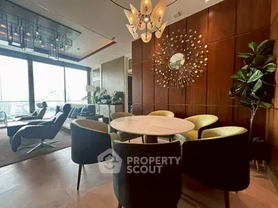 Luxurious living room with modern decor and large windows offering stunning views