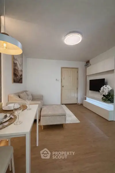 Modern living room with stylish decor and cozy seating area