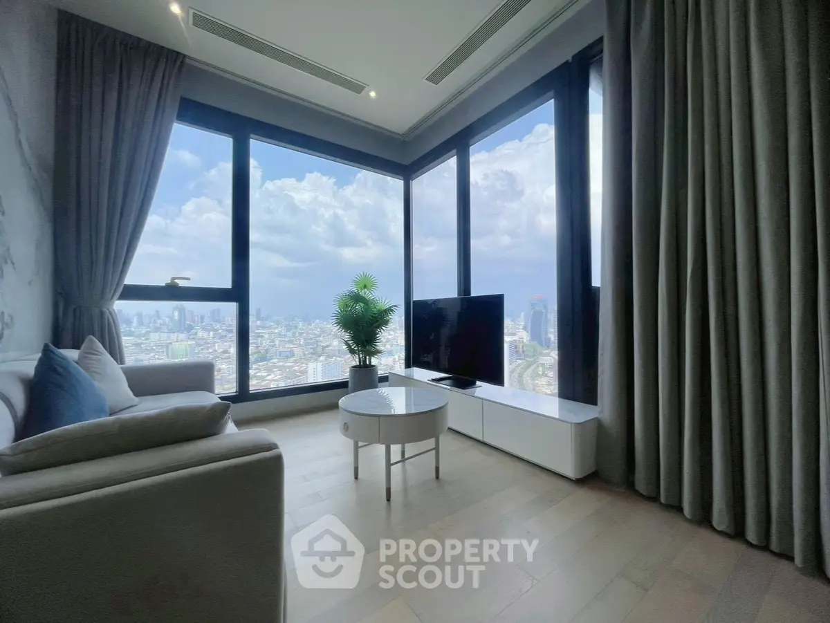 Luxurious corner living room with panoramic city views and modern decor