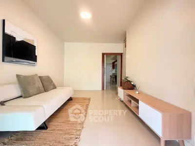 Modern living room with sleek furniture and minimalist decor
