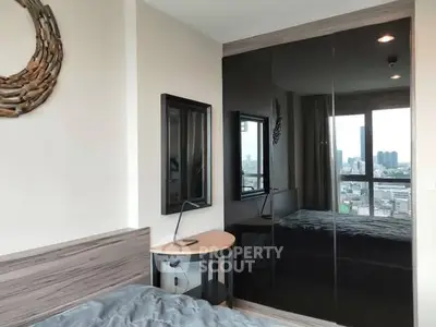 Modern bedroom with city view and stylish decor