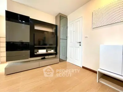 Modern living room with sleek entertainment unit and minimalist decor
