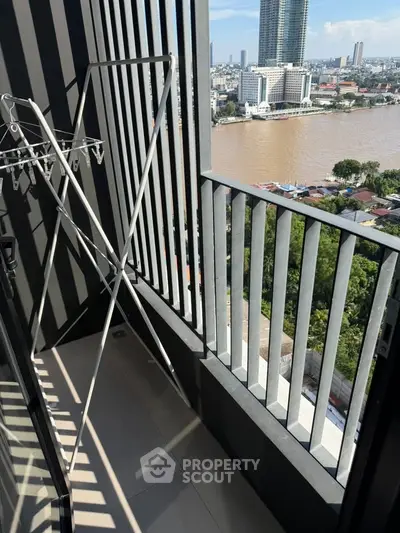 Modern balcony with stunning river view in high-rise apartment