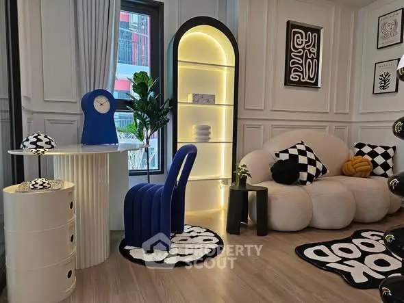 Stylish modern living room with unique furniture and artistic decor