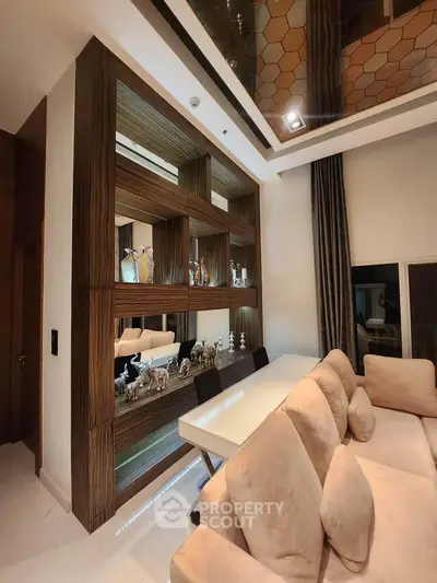 Luxurious living room with elegant decor and plush seating in modern apartment