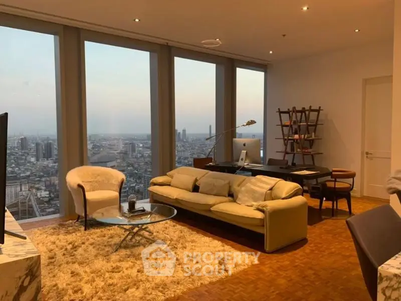 Luxurious living room with stunning city view, featuring modern furniture and elegant decor.