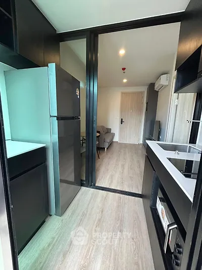 Modern apartment kitchen with sleek design and open layout
