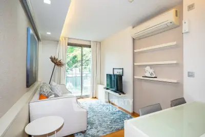 Modern living room with air conditioning and balcony view