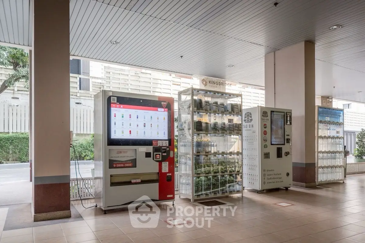 Modern building entrance with vending machines and sleek design