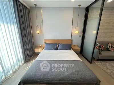 Modern bedroom with stylish decor and natural light