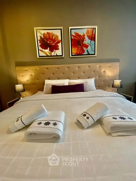 Luxurious bedroom with elegant decor and plush bedding, perfect for relaxation and comfort.