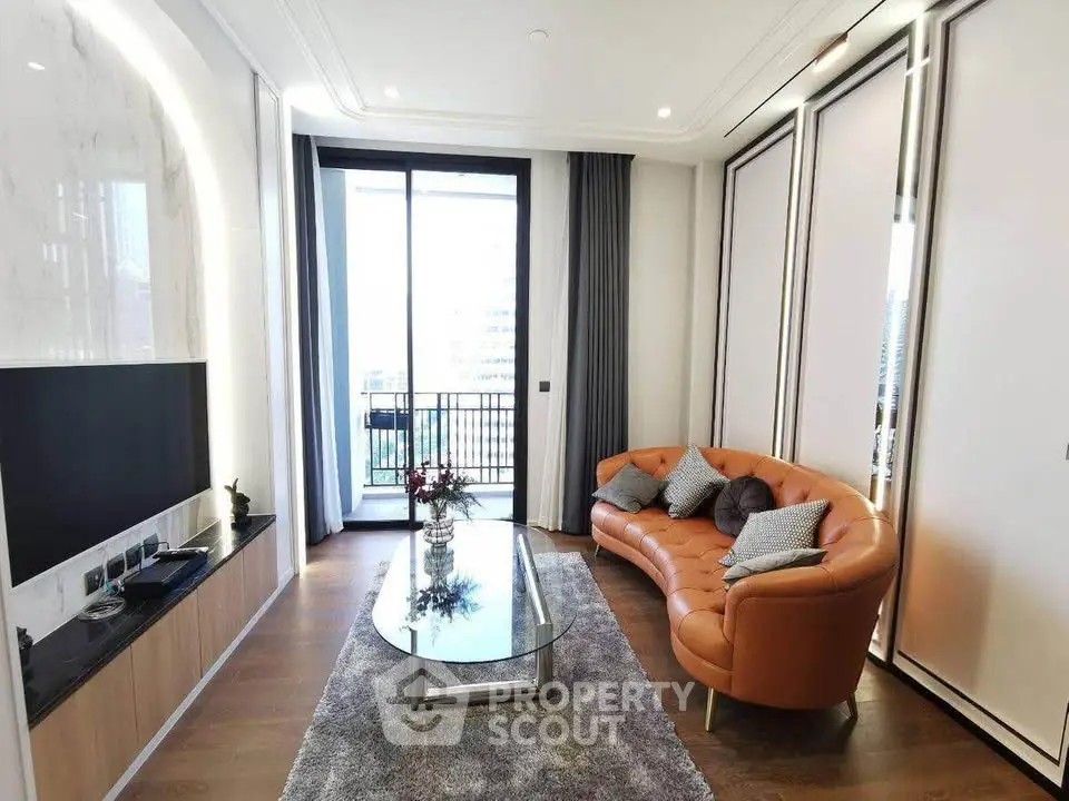 Luxurious living room with modern decor and balcony view