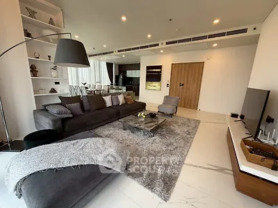 Luxurious modern living room with elegant decor and open kitchen layout