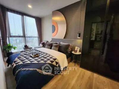 Luxurious modern bedroom with large window and stylish decor