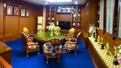 Luxurious study room with elegant wooden decor and plush seating