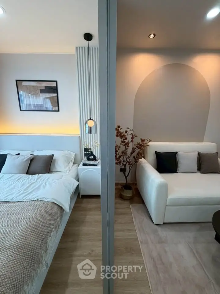 Modern bedroom and living room with stylish decor and cozy ambiance