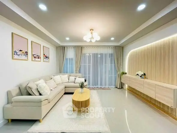 Elegant modern living room with stylish decor and cozy ambiance.
