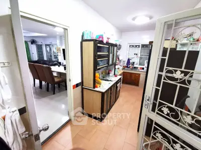 Spacious kitchen with open layout and dining area in modern home