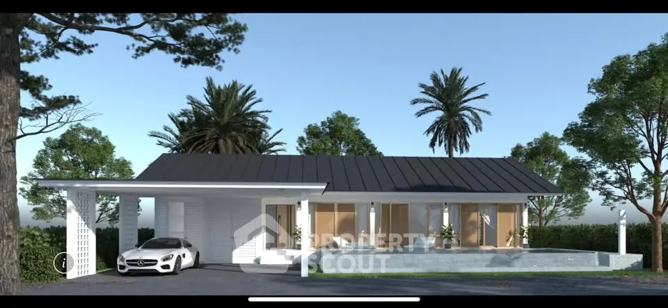 Modern single-story home with sleek design and luxury car in driveway.