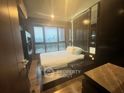 Luxurious bedroom with stunning city view and modern decor