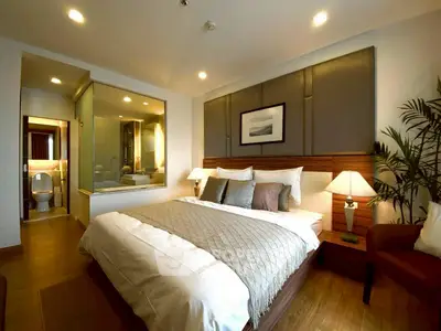 Luxurious bedroom with ensuite bathroom and elegant decor