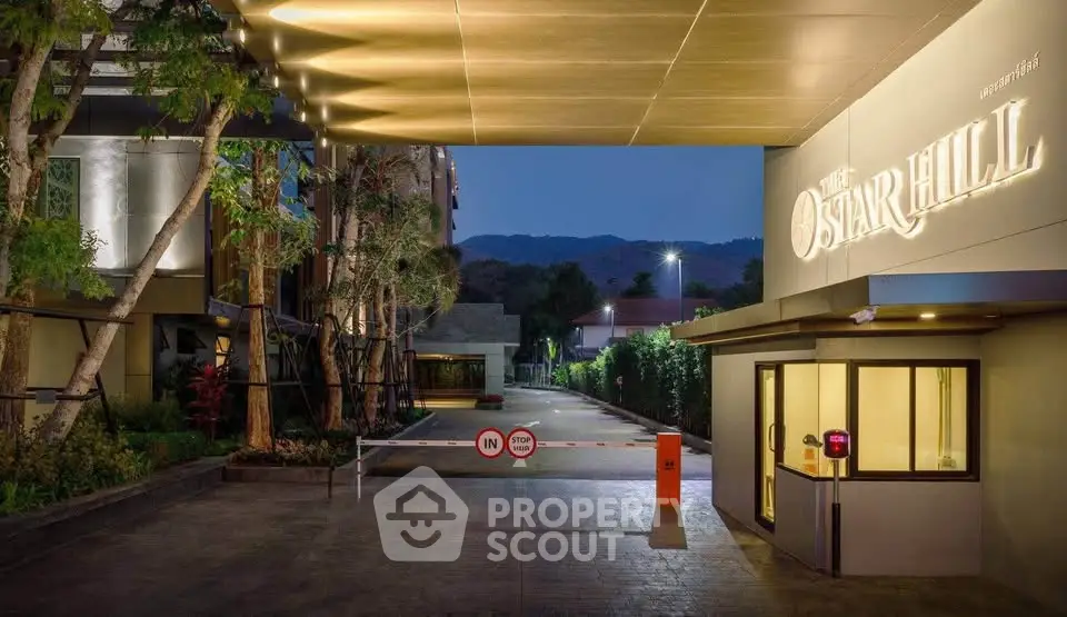 Elegant entrance of The Star Hill with modern design and scenic mountain backdrop, perfect for luxury living.