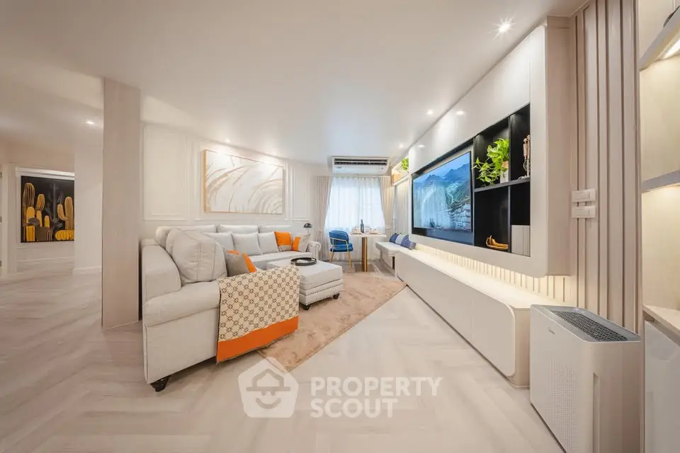 Luxurious modern living room with elegant decor and spacious layout, perfect for relaxation and entertainment.