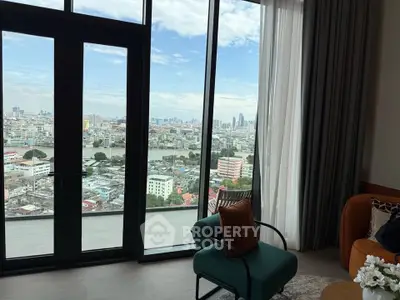 Stunning city view from modern living room with floor-to-ceiling windows and stylish furniture.